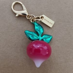 Coach "radish" charm